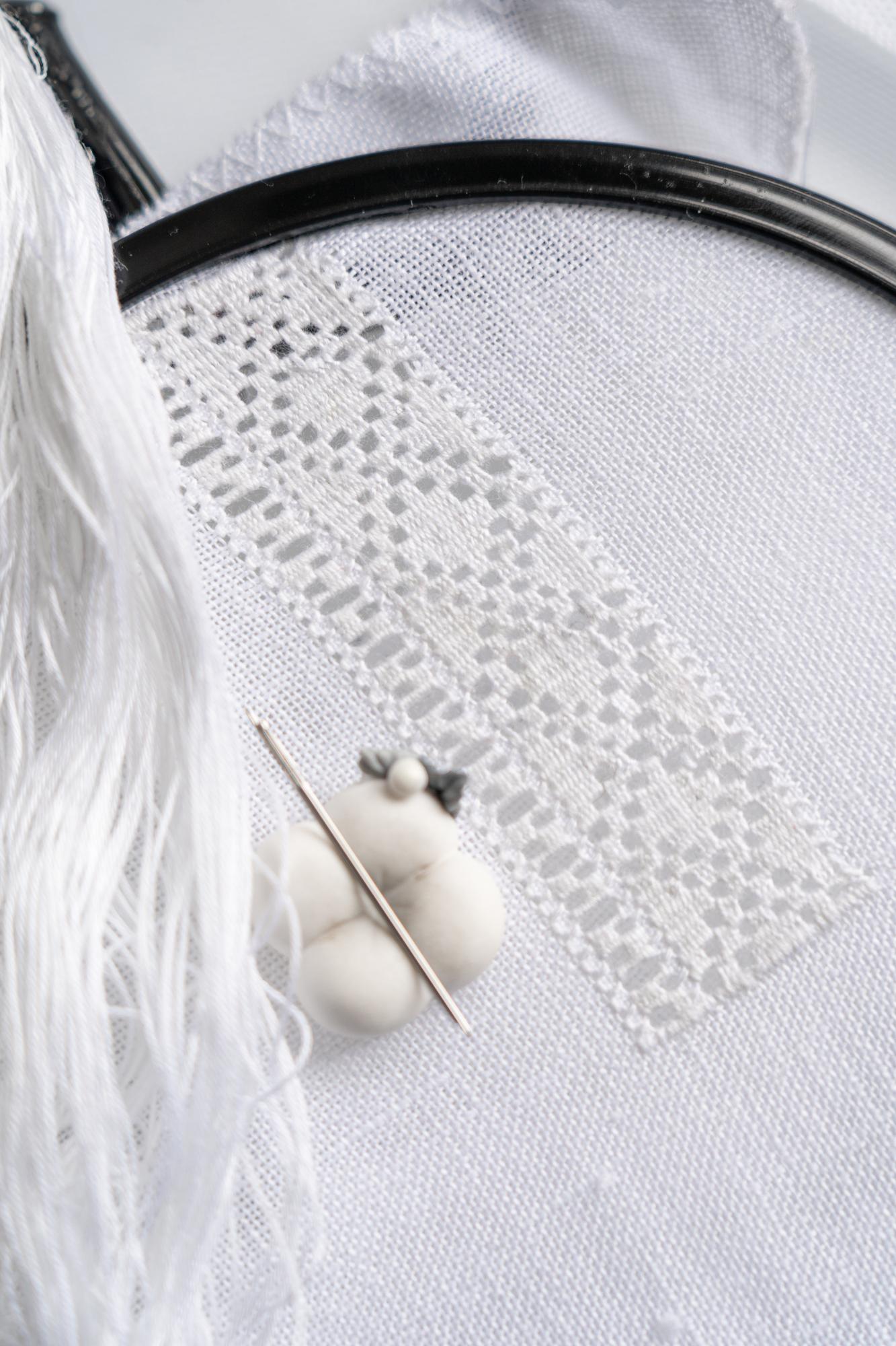 white-on-white tonal embroidery on bridal veil